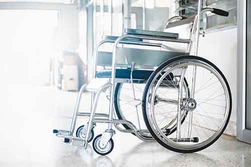This image shows a wheelchair. Contact a Garden City spinal cord injury lawyer at Cellino Legal for a free case evaluation.