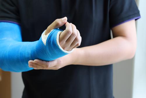 A man with a fractured arm from a dog attack.