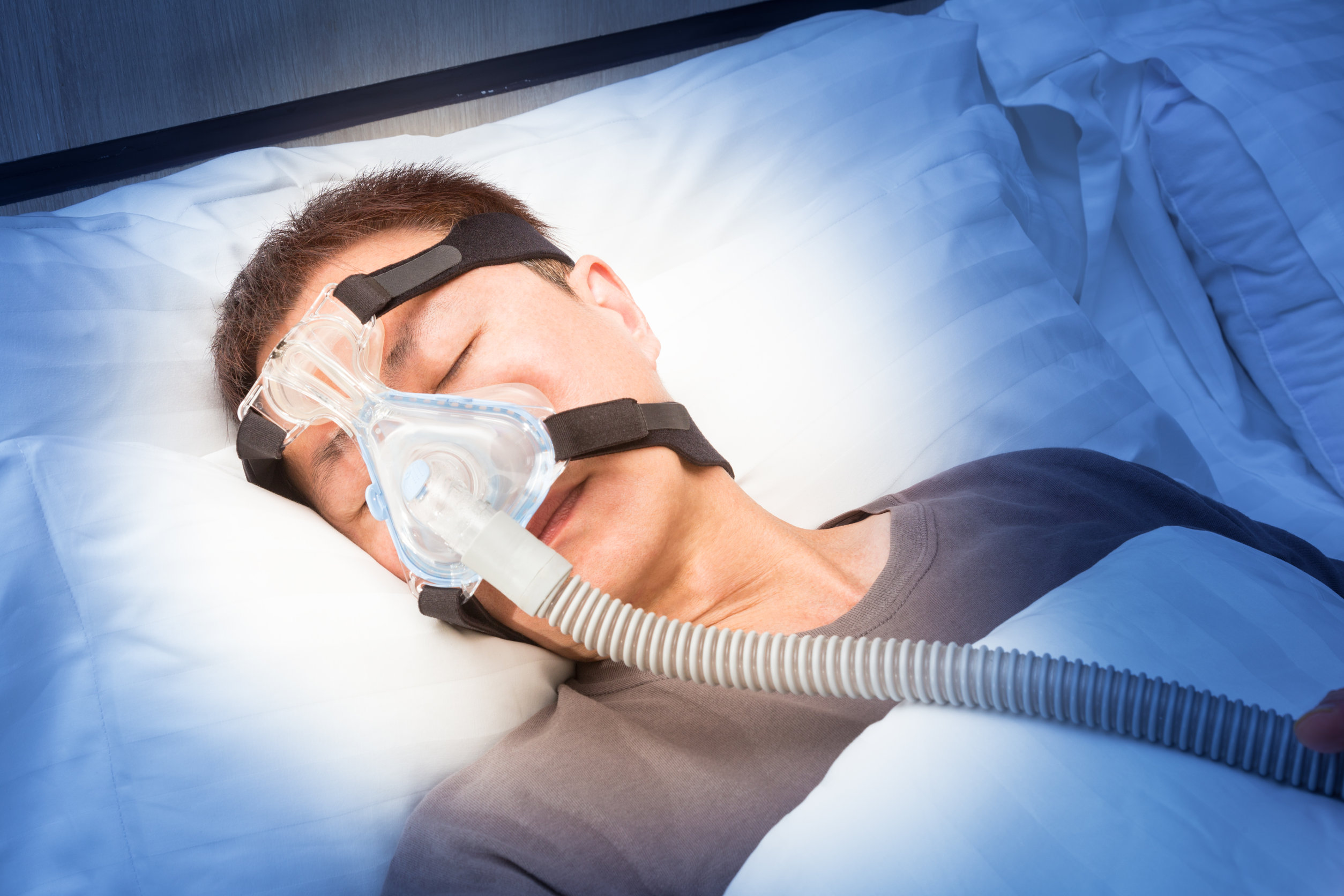 cpap machine on sleeping person